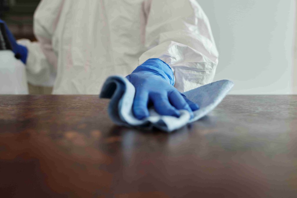 Cleaner in protective gear