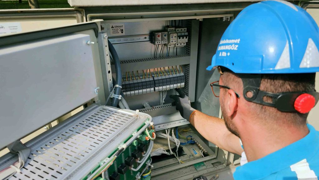 electrician on circuitboard